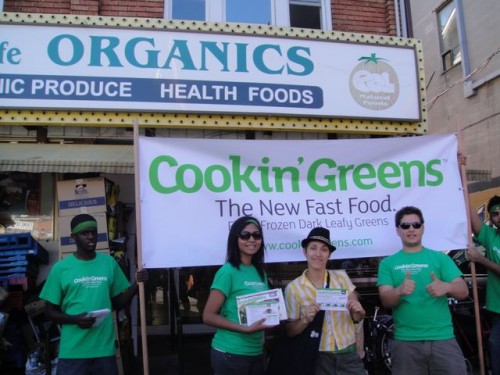 In front of Essence of  Life Organics store with a new Cookin’ Greens Fan